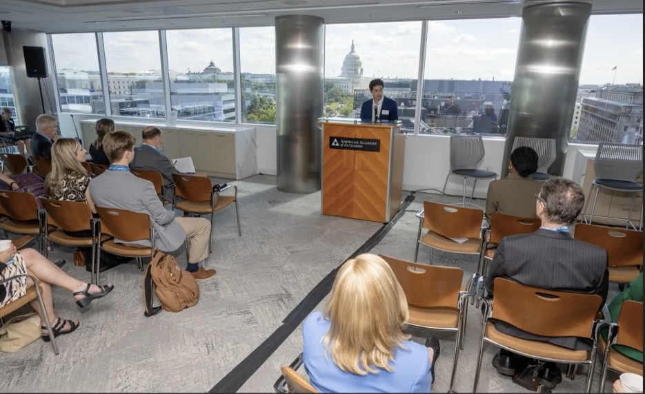 Retirement VP Jason Russell opens the symposium